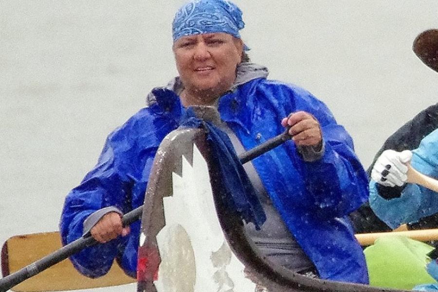 Alex Wilson, paddling a canoe